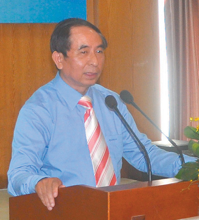 越南翻译家、越中友好协会副会长阮荣光。 本报记者 刘 刚摄 越南翻译家、越中友好协会副会长阮荣光。 本报记者 刘 刚摄