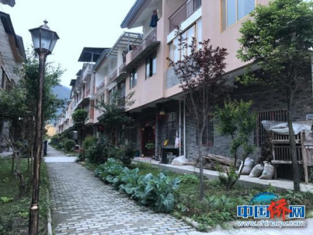 建成并投入使用的“上坝陈卓贤侨爱新村—侨心居”。钟欣 摄 建成并投入使用的“上坝陈卓贤侨爱新村—侨心居”。钟欣 摄
