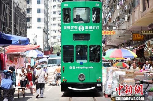 资料图:香港回归20年来,不少近百年历史的街道不但风采依然,而且容光焕发。 资料图:香港回归20年来,不少近百年历史的街道不但风采依然,而且容光焕发。