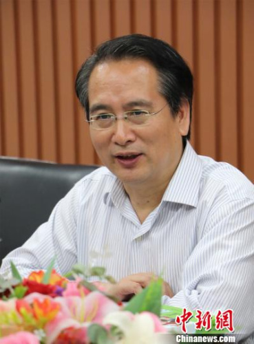 图为:谭天星寄语<a target='_blank' href='http://www.chinanews.com/'>中新社</a>浙江分社的采编队伍。 王刚 摄 图为:谭天星寄语<a target='_blank' href='http://www.chinanews.com/'>中新社</a>浙江分社的采编队伍。 王刚 摄