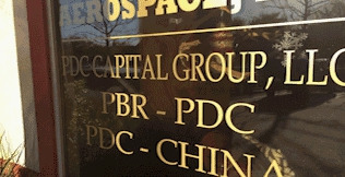 今年四月摄于PDC公司外(美国中文网/何晰媛 摄) 今年四月摄于PDC公司外(美国中文网/何晰媛 摄)