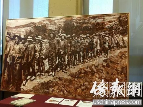 旅美画家创作反映铁路华工主题的油画《背井离乡》。(美国《侨报》张苗 摄) 旅美画家创作反映铁路华工主题的油画《背井离乡》。(美国《侨报》张苗 摄)