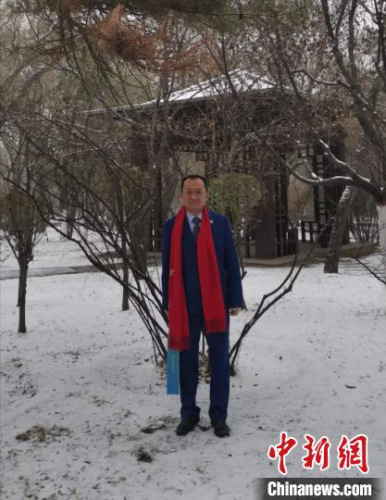 对来自香港的李红光而言,能巧遇太原的第一场雪,令他感到惊喜。受访者供图 对来自香港的李红光而言,能巧遇太原的第一场雪,令他感到惊喜。受访者供图