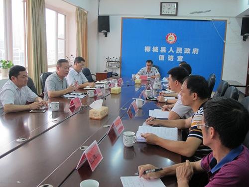 中国侨网图为柳州市外侨办主任庞智勇在座谈会上发言