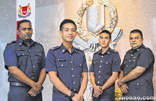 丁警曹长(左起)、助理警监杨文玮、助理警监邓文豪和阿赫巴高级驻署警长在小印度骚乱事件中英勇的表现,让他们获得今年的国庆表扬奖章。(新加坡《联合早报》/叶振忠