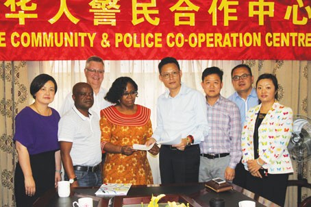 中国侨网约堡非国大党部与华人社区签署合作备忘录。(南非华侨新闻网)