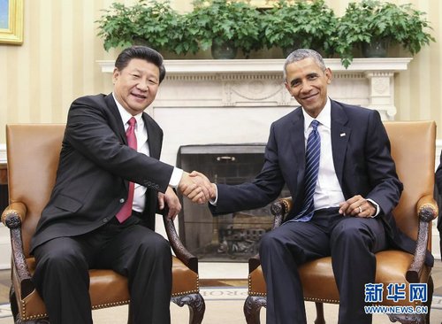 9月25日，中国国家主席习近平在华盛顿白宫同美国总统奥巴马举行小范围会谈。(新华社/兰红光