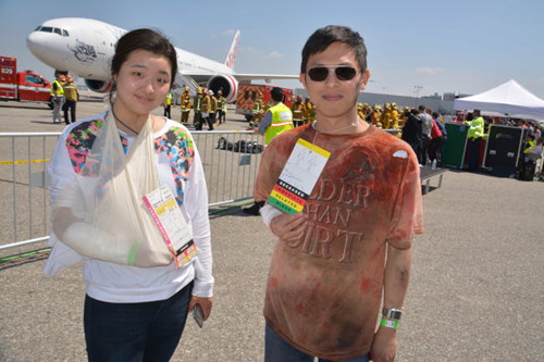 华裔义工参加洛杉矶机场演习 了解航空安全知