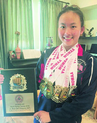 华裔空手道少女田妤倩再夺“世界比武大赛”总冠军。(钱女士提供)