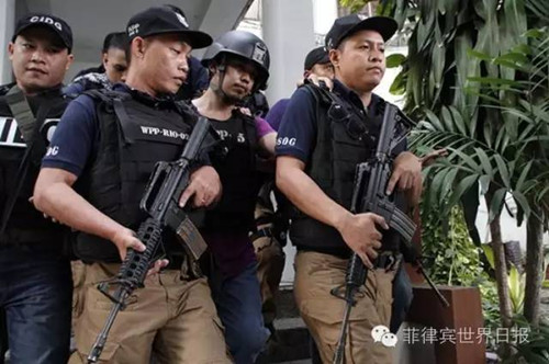 资料图:菲国警刑侦大队成员。(菲律宾《世界日报》)