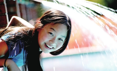 菲菲13岁时的照片。(图片来源：京华时报)