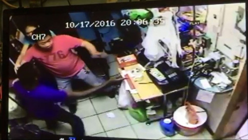 非裔歹徒闯入费城华人洗衣店行劫，华人老板董运斌夫妇英勇抗贼。(美国《世界日报》资料图)