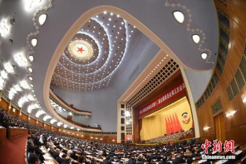 中国侨网3月9日，全国政协十二届五次会议在北京人民大会堂举行第二次全体会议。 中新社记者 侯宇 摄
