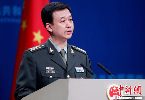 中国侨网3月30日下午,中国国防部新闻发言人吴谦回答记者提问。中新社记者 宋吉河 摄