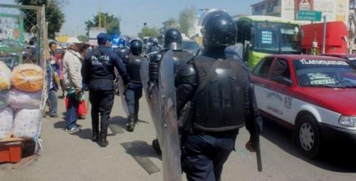 中国侨网大批警力在华雷斯街道巡逻。(美国圣地亚哥华文网/Quadratín Oaxaca图片)