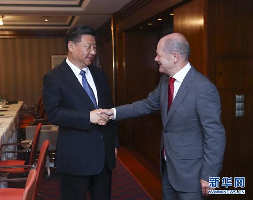 中国侨网7月6日，国家主席习近平在汉堡会见汉堡市市长肖尔茨。 新华社记者谢环驰 摄 图片来源：新华网