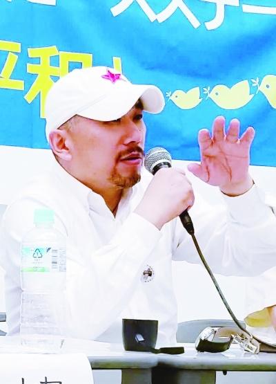 中国侨网吴先斌在名古屋向日本民众作报告。