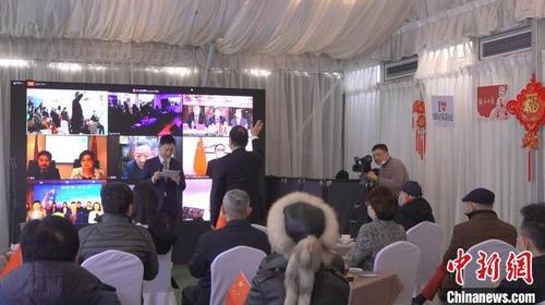 中国侨网5大洲6个国家7座城市的海外侨胞参加“迎新春·迎冬奥”海外侨胞助力冬奥视频连线活动。　康玉湛　摄