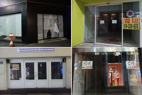 中国侨网明洞众多店面前贴有“租赁”字样的标识。(韩国亚洲经济中文网)