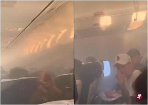 中国侨网新时代航空飞机乘客拍下机舱瀰漫浓烟的画面。 