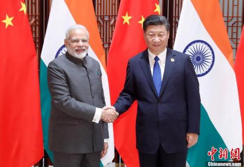 中国侨网9月5日，中国国家主席习近平在厦门会见印度总理莫迪。中新社记者 杜洋 摄 