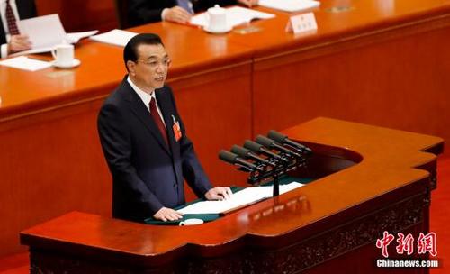 中国侨网3月5日,十三届全国人大一次会议在北京开幕。中新社记者 盛佳鹏 摄