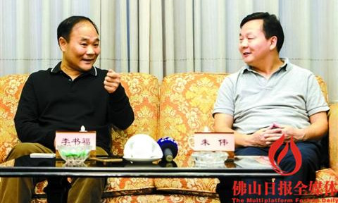 朱伟（右）会见吉利董事长李书福。