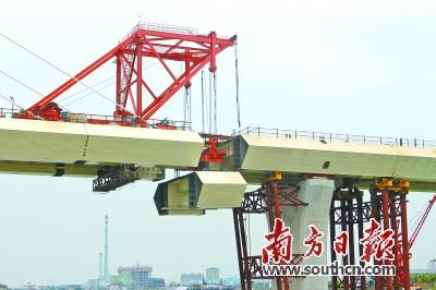 中国侨网江门潭江特大桥顺利合龙，为深茂铁路江茂段2018年6月建成通车夯实了基础。资料图片