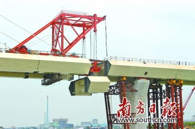 中国侨网江门潭江特大桥顺利合龙,为深茂铁路江茂段2018年6月建成通车夯实了基础。资料图片