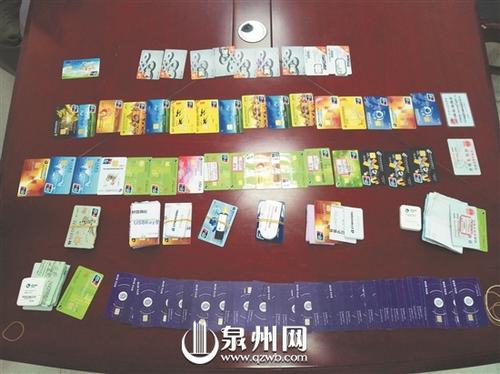 中国侨网团伙利用别人身份证办理的银行卡、手机卡。 颜伟国 文\图