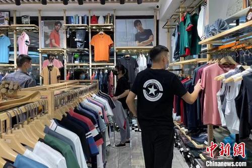 中国侨网在做好疫情防控的基础上,石狮服装城复工率已超过95%。 石狮服装城供图