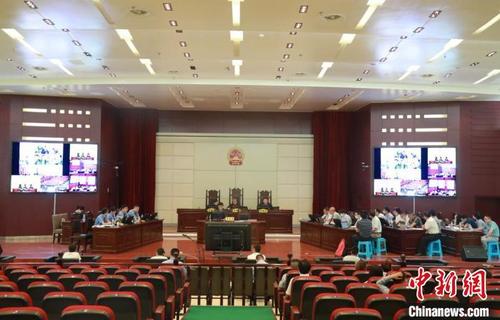 中国侨网江西宣判一起特大跨国电信网络诈骗案。　抚州中院 供图