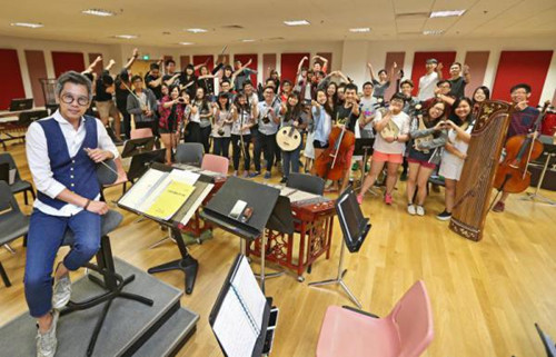 南洋爱乐华乐团于2013年成立，团员多为刚就业的青年才俊。（新加坡《联合早报》/叶振忠