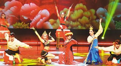 中国侨网2月11日，“文化中国·四海同春”亚洲团在韩国首尔举行春节访问演出。图为演员表演舞蹈《争奇斗艳》。(新华社记者 姚琪琳 摄)