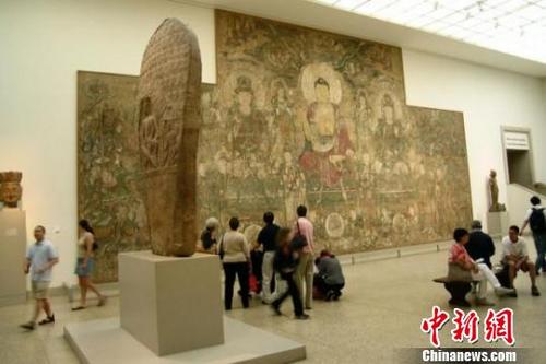 中国侨网美国大都会博物馆收藏的《药师经变》壁画 资料图