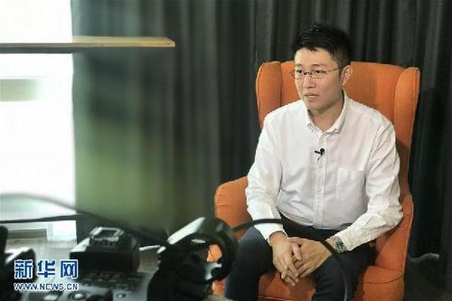 中国侨网4月12日,泰国电视3台记者唐海源在曼谷接受新华社记者采访。新华社记者 李欣莹 摄