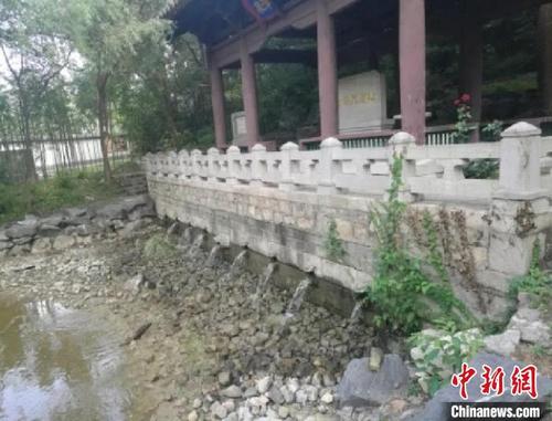 中国侨网图为北京市昌平区白浮泉遗址。 北京市文物局供图