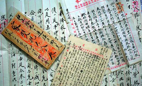 收藏家走访收集侨批枪支 见证艰苦抗战史(图)